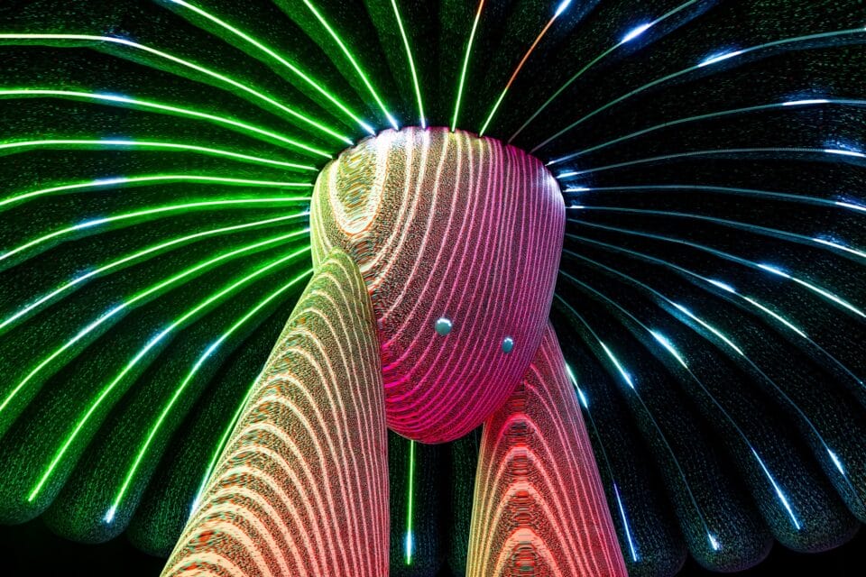 a detail of an illuminated installation with lights resembling the underside of a mushroom