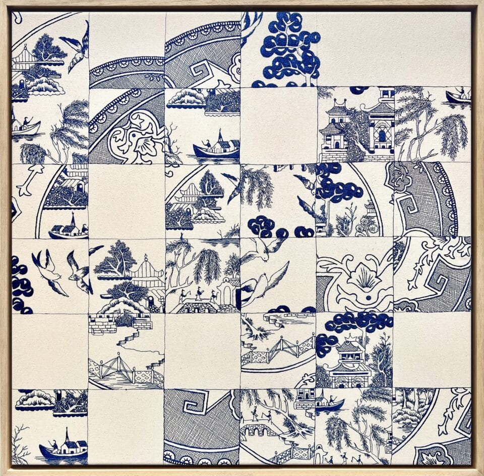 an embroidery of blue-and-white porcelain pieces arranged like puzzle pieces