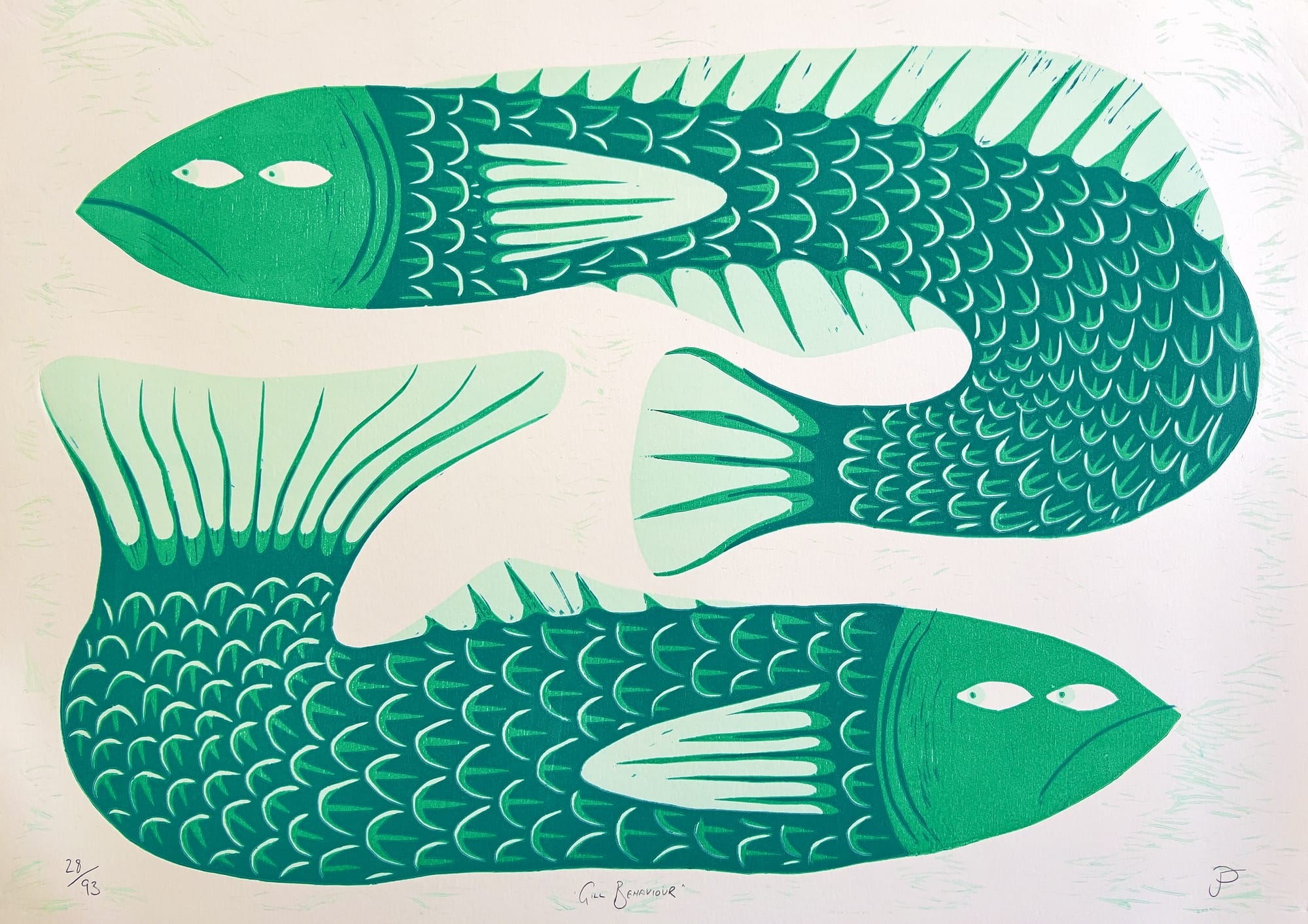 a woodblock print of two green fish facing in different directions